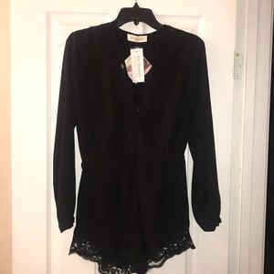 Brand new black lace romper from Kittenish